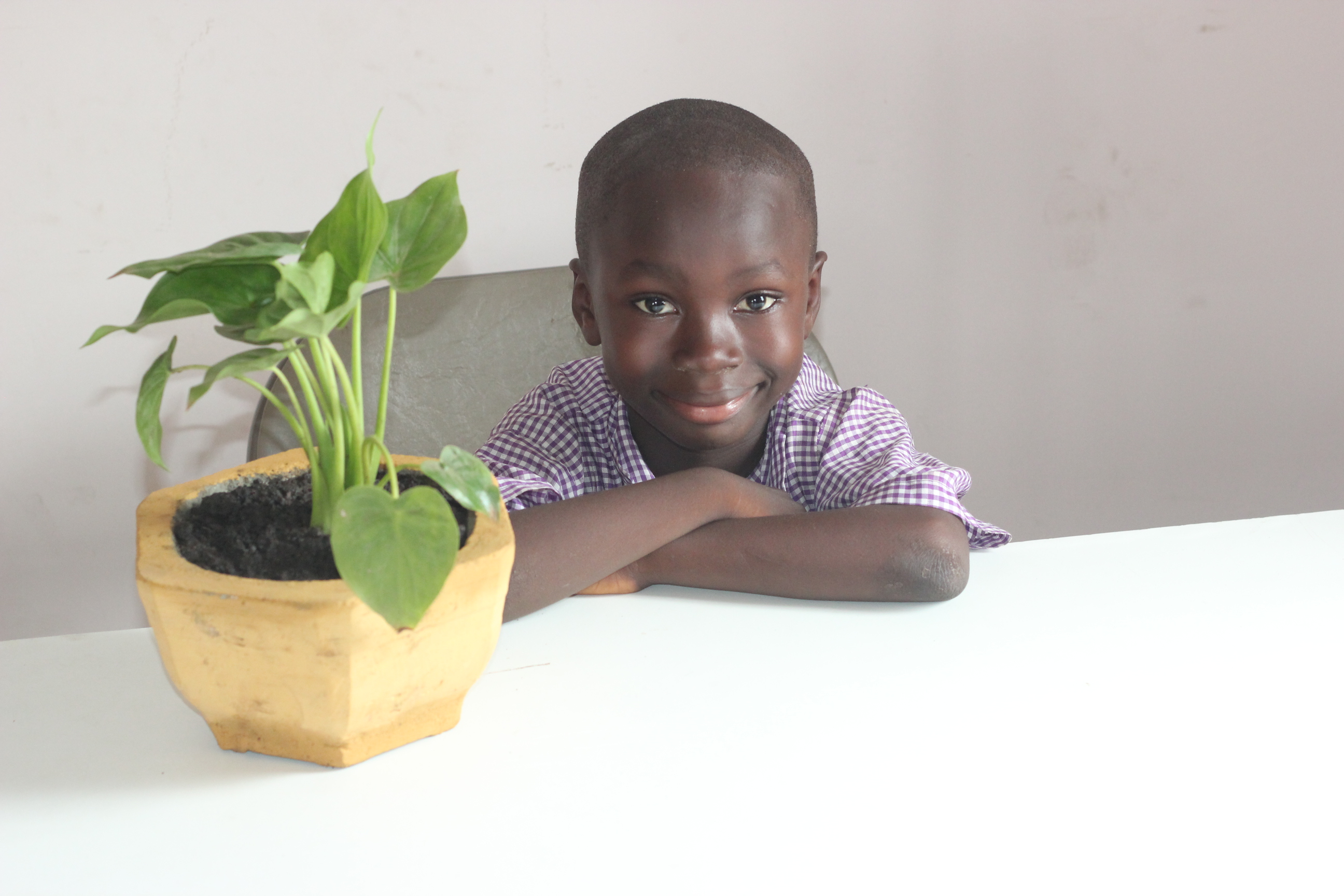 Boy with plants 