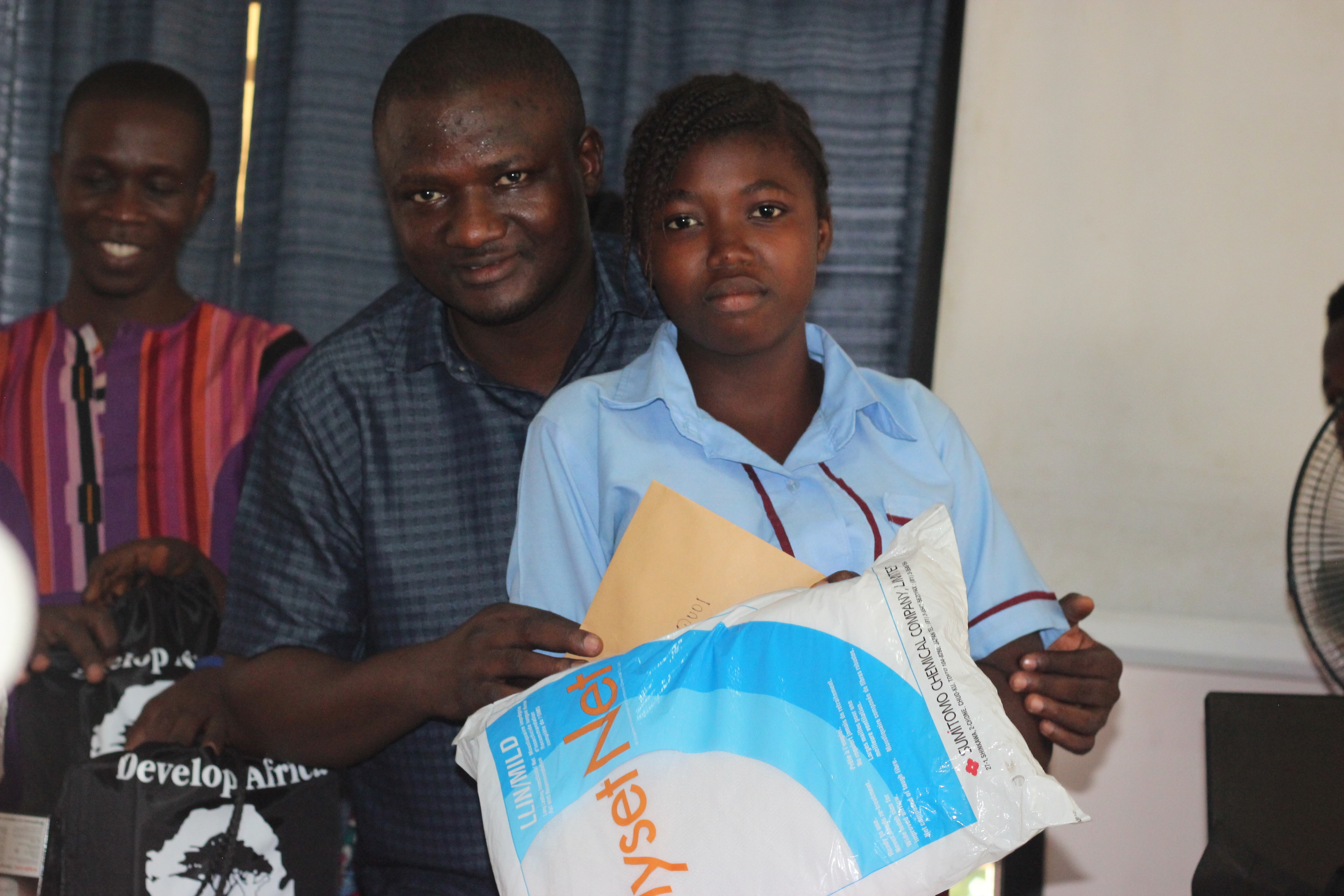 Family with bed net 