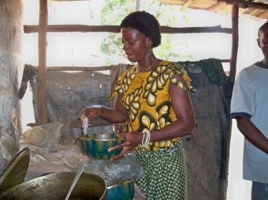 Isata as her table - microfinance business 