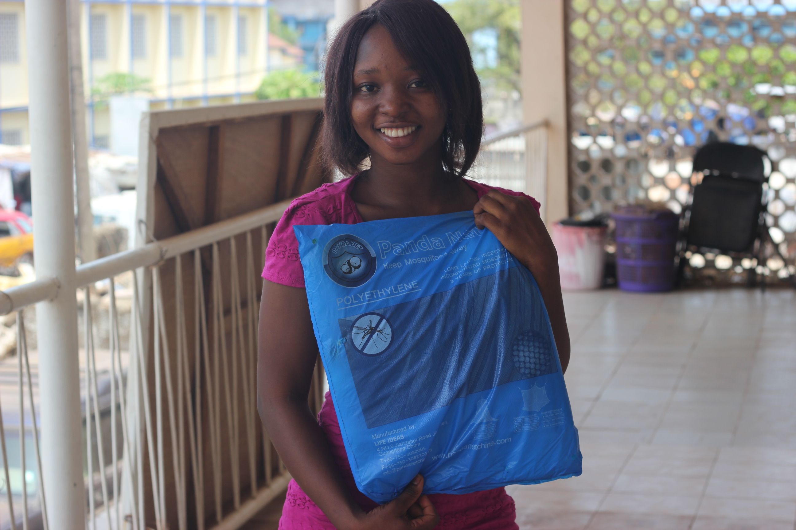 Marion holding bag of mosquito repellent 