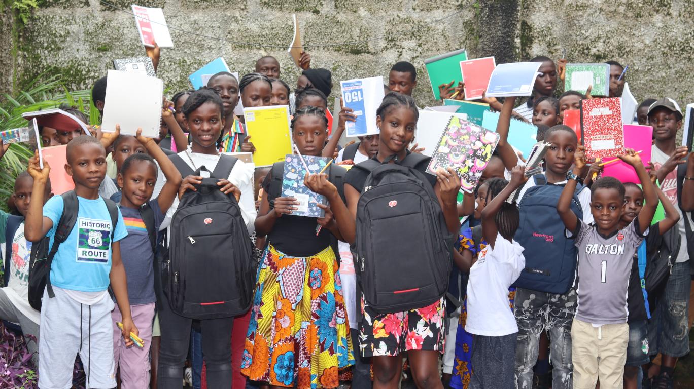 Freetown Students with the new school supplies they received