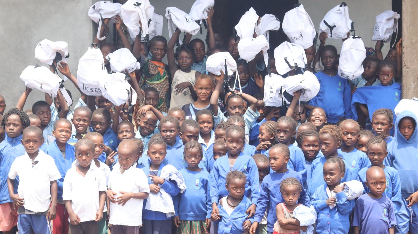 Kagbaray Students holding their new clothes & school bags