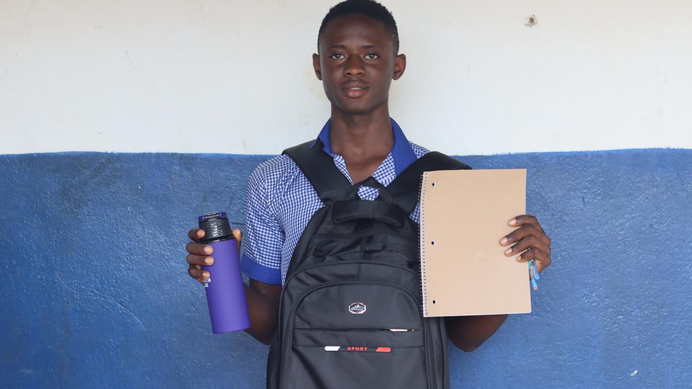 Steven with his new school supplies