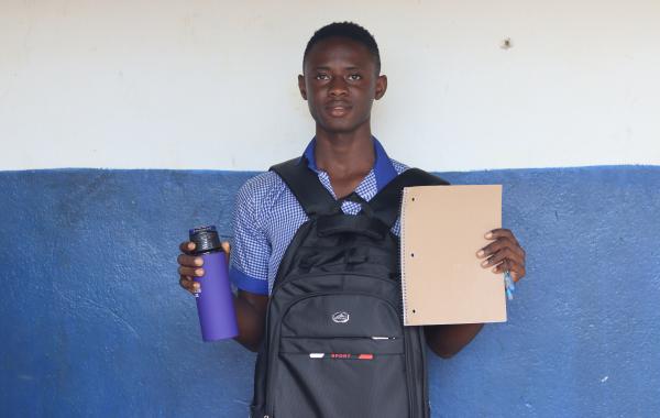 Steven with his new school supplies