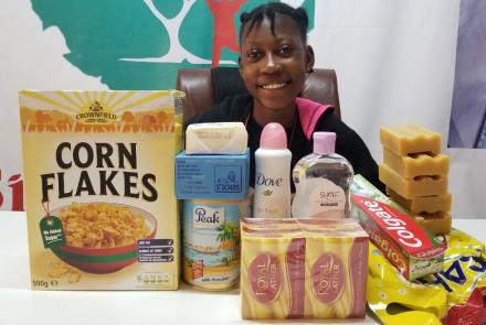 Joy with food & toiletries from her sponsor