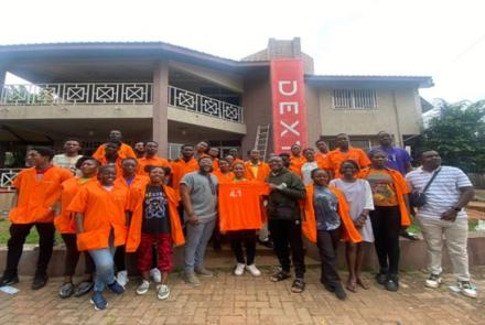 Photograph of a cross-section of DEXT Team Members at the headquarters in Kumasi Ghana