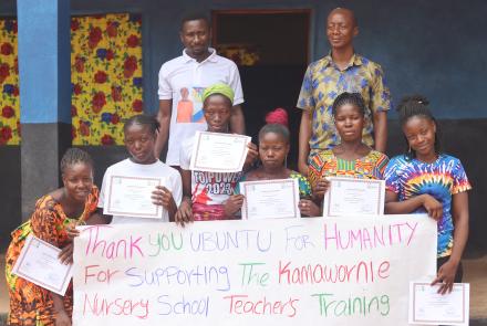 Teachers from Training Session with sign thanking Ubuntu for Humanity