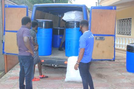 Arrival of barrels or drums of school supplies at develop africa office in Sierra Leone